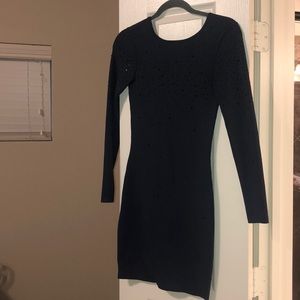 Beautiful bandage type dress with black stones.